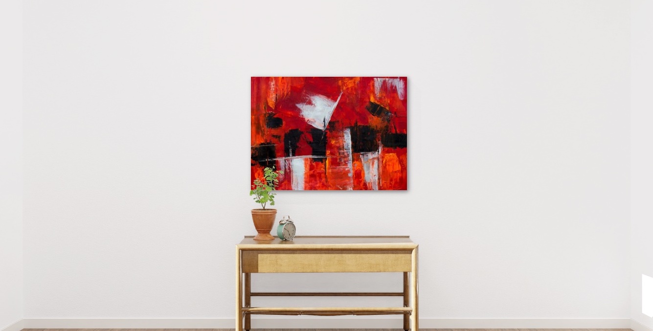 Image of a red artwork hanging on the wall