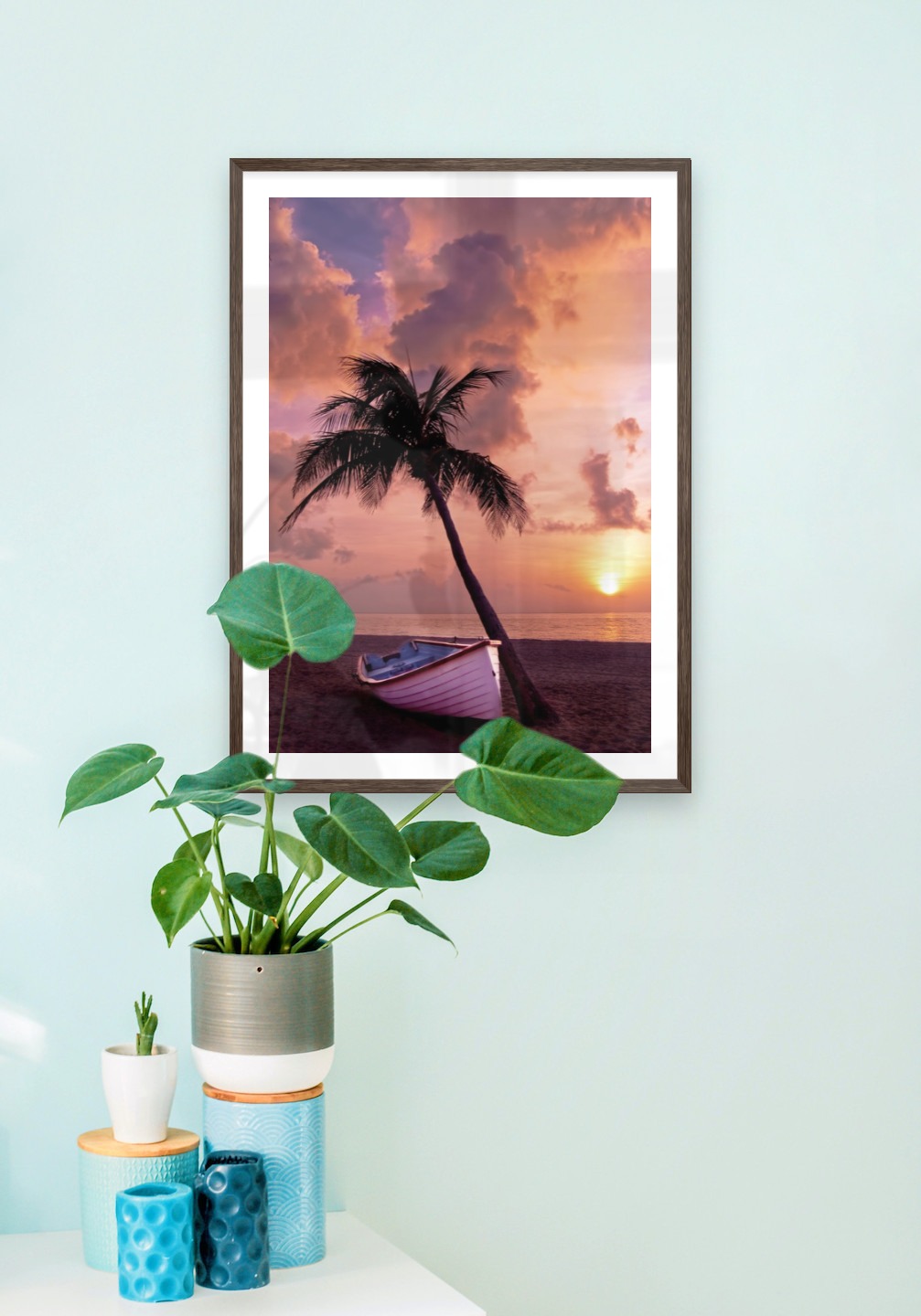 Gallery wall with picture frame in dark wood in size 50x70 with print "Palm on the beach"