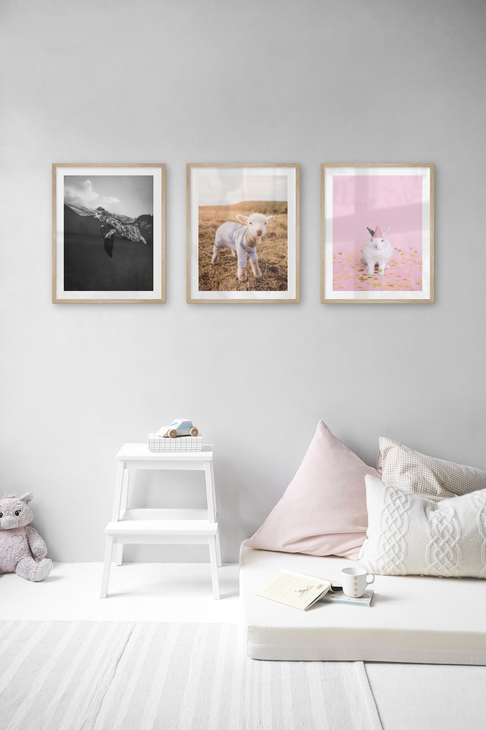 Gallery wall with picture frames in wood in sizes 40x50 with prints "Turtle", "Lamb" and "Rabbit with party hat"