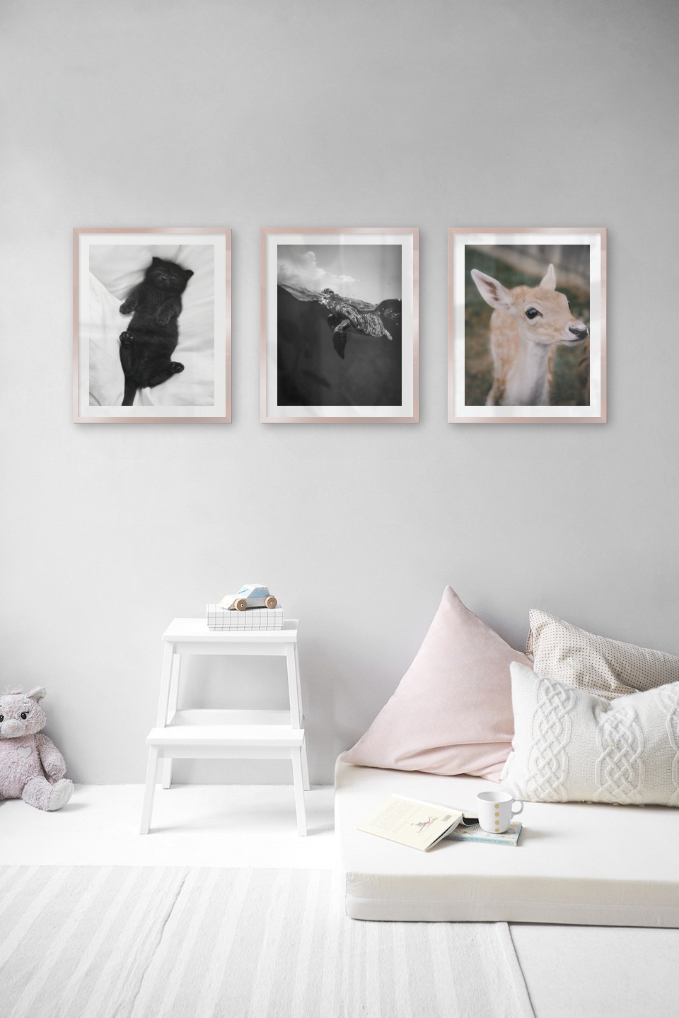 Gallery wall with picture frames in copper in sizes 40x50 with prints "Cat in bed", "Turtle" and "Deer"