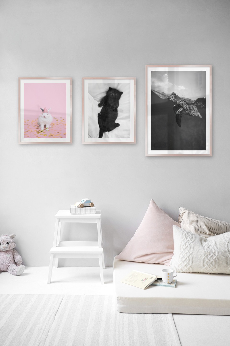 Gallery wall with picture frames in copper in sizes 40x50 and 50x70 with prints "Rabbit with party hat", "Cat in bed" and "Turtle"