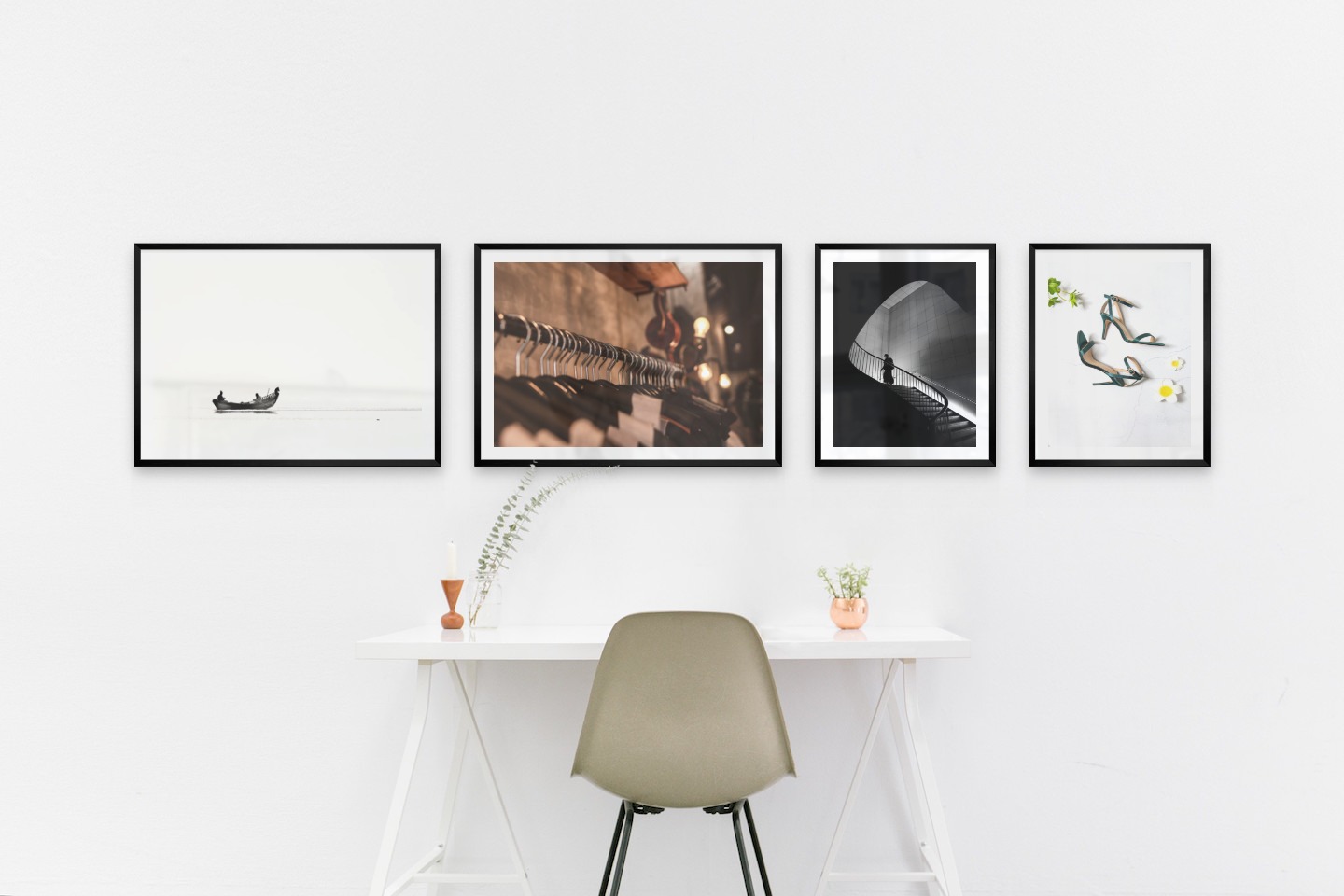 Gallery wall with picture frames in black in sizes 50x70 and 40x50 with prints "People in boat", "Clothes hangers", "Staircase" and "Heels"