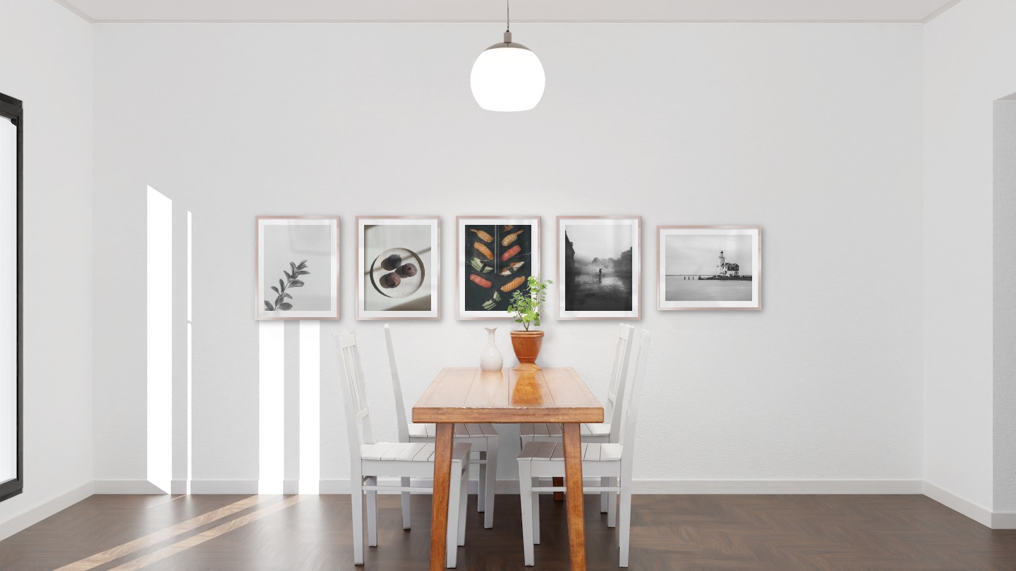 Gallery wall with picture frames in copper in sizes 40x50 with prints "Twig", "Fruit on plate", "Sushi", "Rainy city" and "Pier with building"