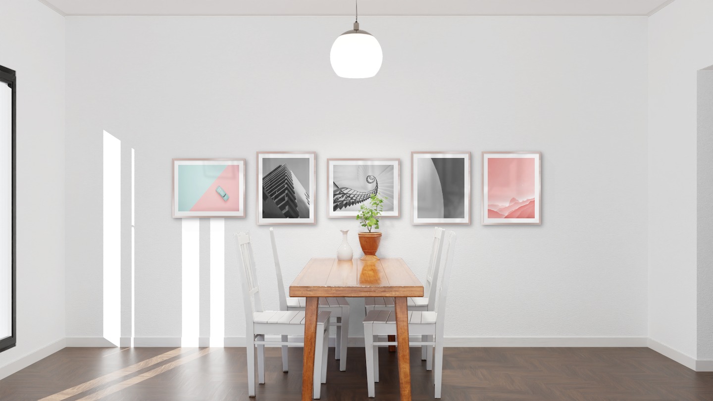 Gallery wall with picture frames in copper in sizes 40x50 with prints "Blue car and pink", "Black and white building", "Circular stair railing", "Line" and "Pink sky"