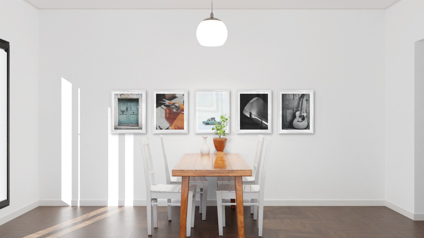 Gallery wall with picture frames in silver in sizes 40x50 with prints "Door", "Orange vespa", "Car in snow", "Staircase" and "Guitar"
