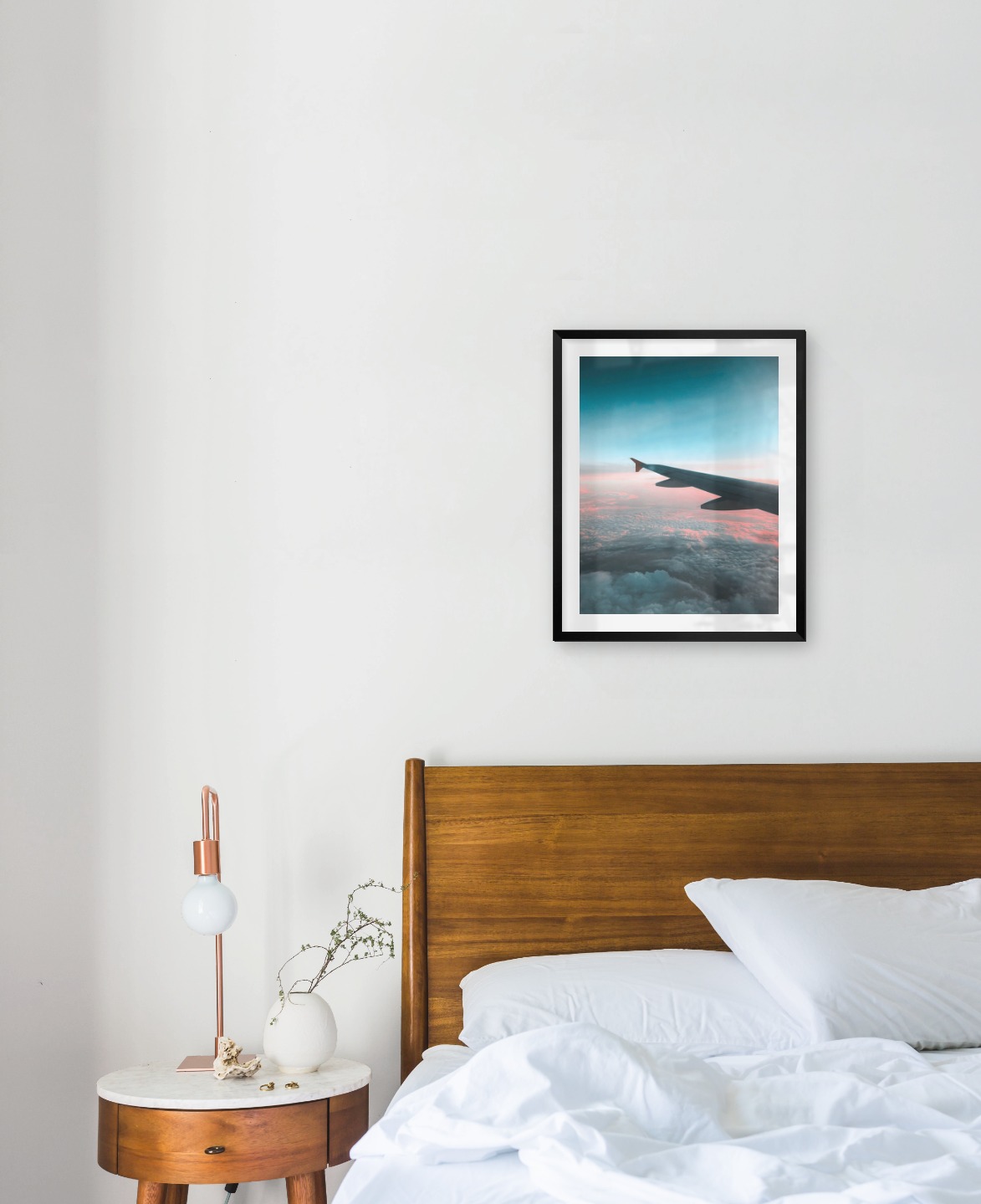 Gallery wall with picture frame in black in size 40x50 with print "Above the clouds"