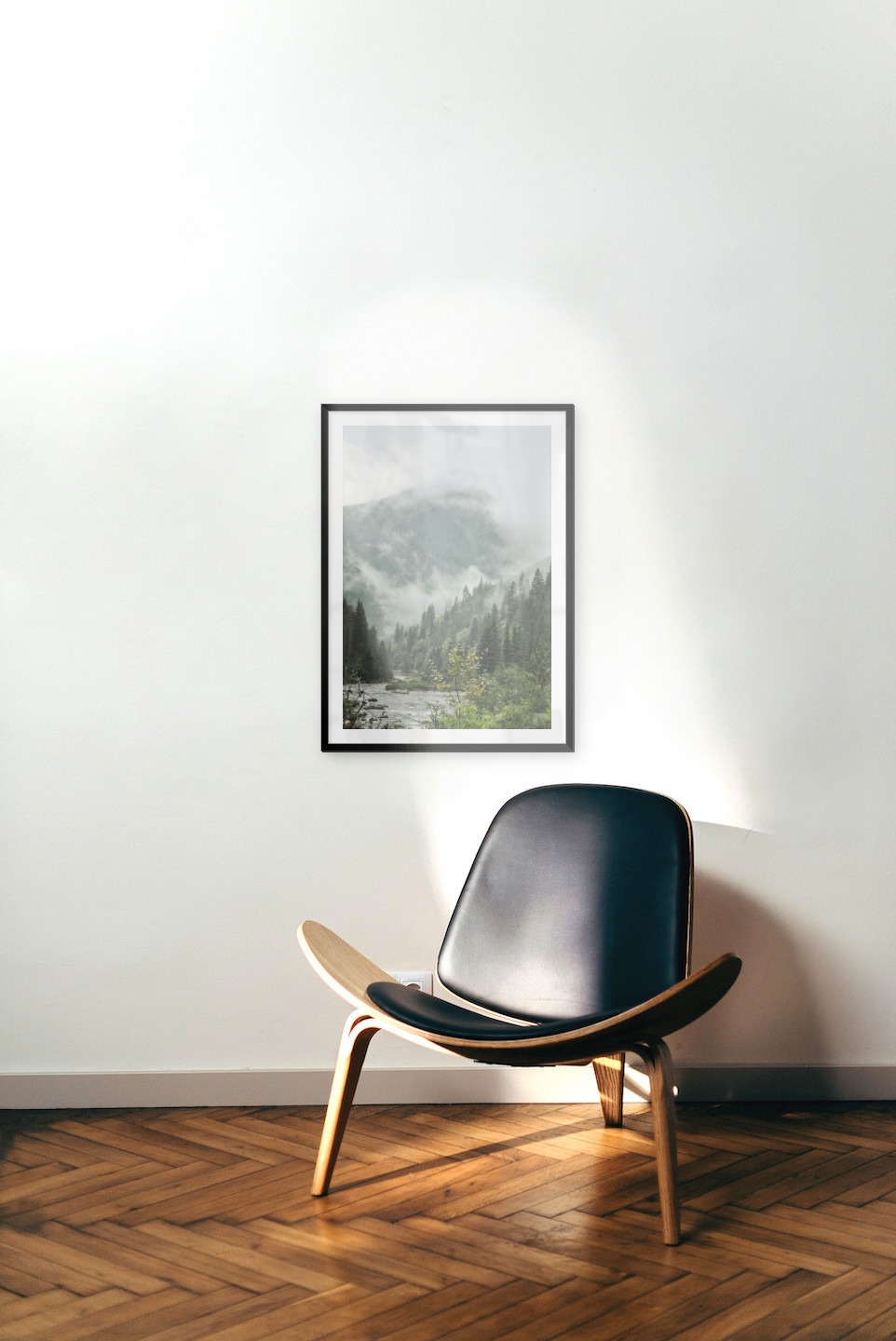 Gallery wall with picture frame in black in size 50x70 with print "River in front of mountains"