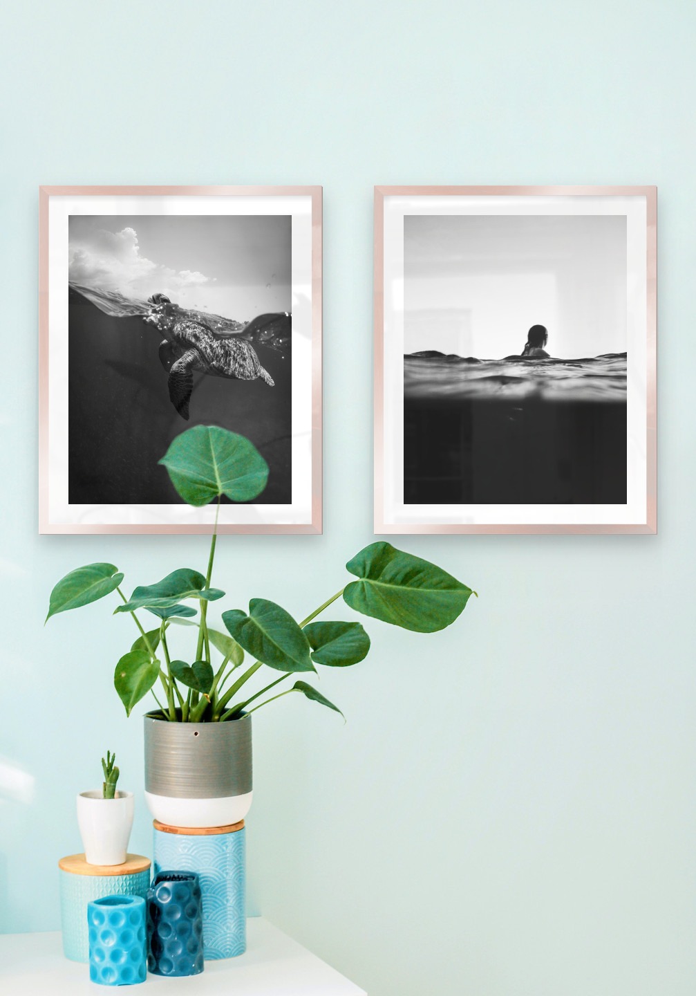 Gallery wall with picture frames in copper in sizes 40x50 with prints "Turtle" and "Person in the water"