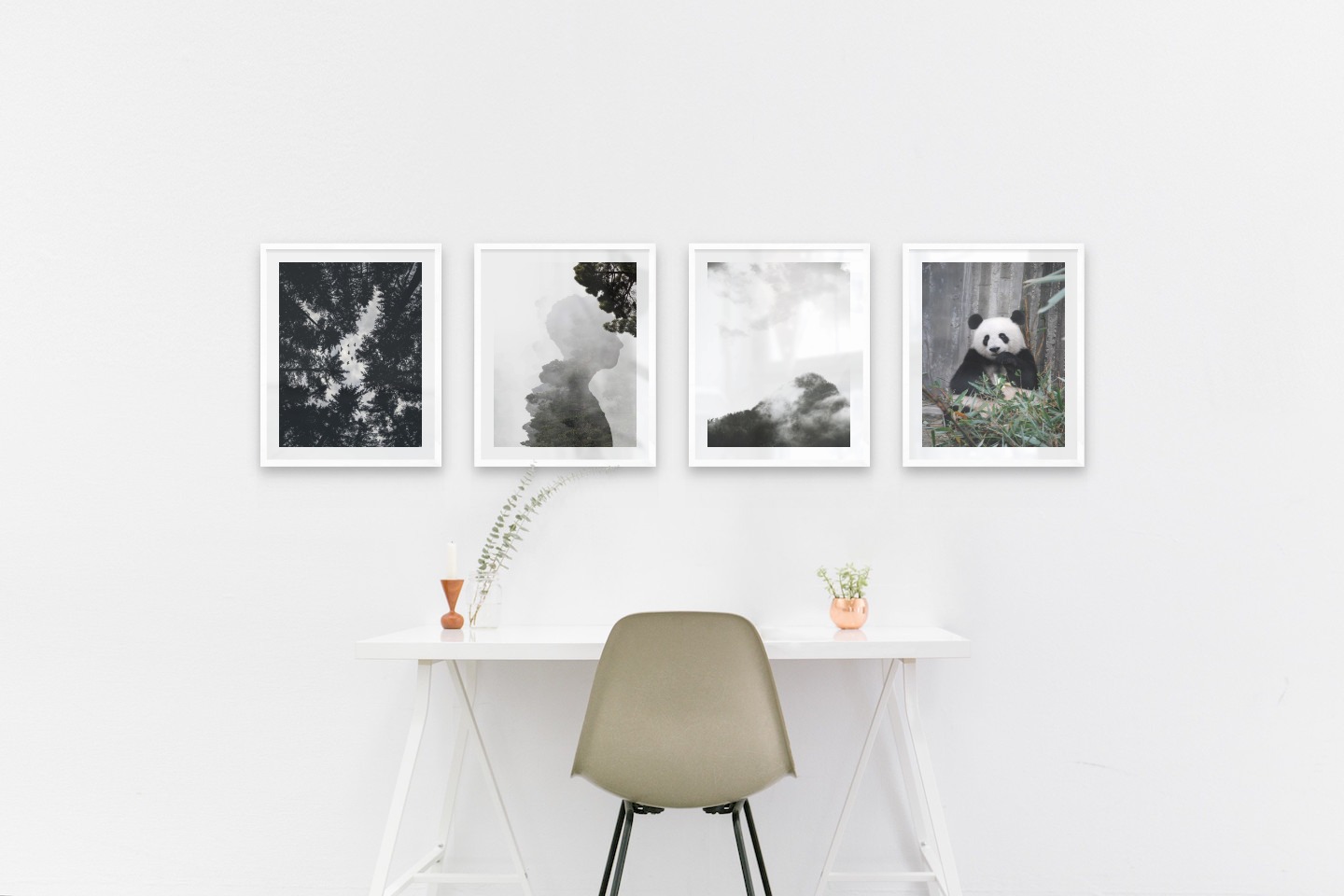 Gallery wall with picture frames in white in sizes 40x50 with prints "Wooden tops and birds", "Silhouette and tree", "Trees and mountains in fog" and "Panda"