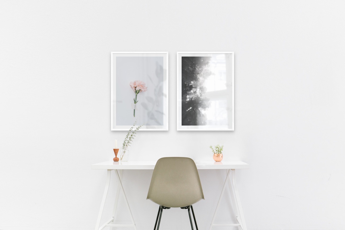 Gallery wall with picture frames in white in sizes 50x70 with prints "Pink flower" and "Foggy wooden tops from the side"