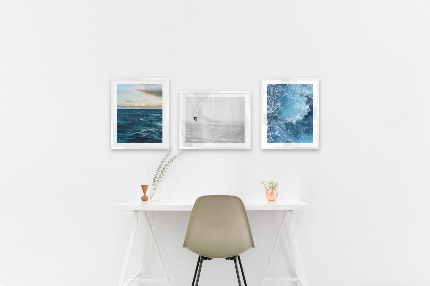 Gallery wall with picture frames in silver in sizes 40x50 with prints "Somewhat out at sea", "Birds over the sea" and "Sea from above"