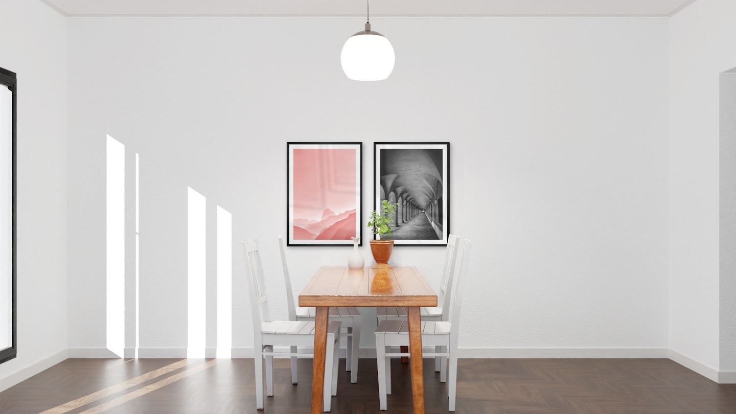 Gallery wall with picture frames in black in sizes 50x70 with prints "Pink sky" and "Hallway with pillars and arches"