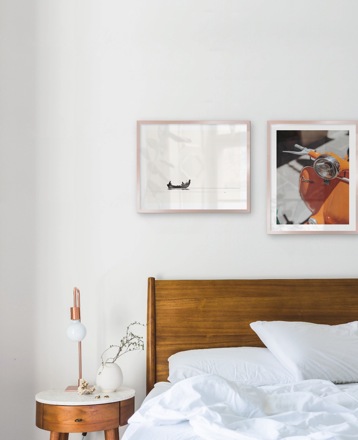 Gallery wall with picture frames in copper in sizes 40x50 with prints "People in boat" and "Orange vespa"