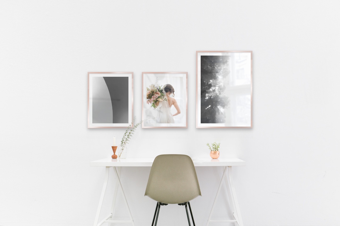 Gallery wall with picture frames in copper in sizes 40x50 and 50x70 with prints "Line", "Bride and flowers" and "Foggy wooden tops from the side"