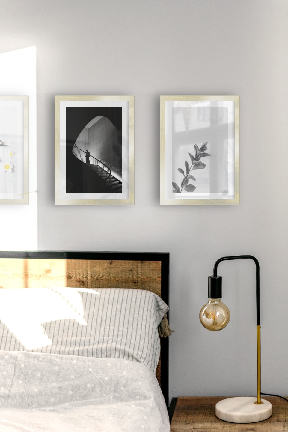 Gallery wall with picture frames in gold in sizes 21x30 with prints "Heels", "Staircase" and "Twig"