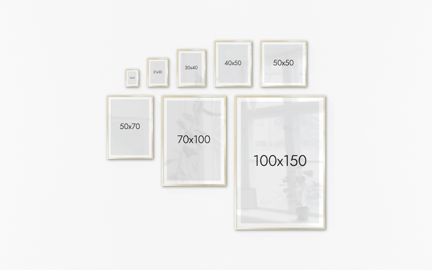 Gallery wall with picture frames in gold in sizes 13x18, 21x30, 30x40, 40x50, 50x50, 50x70, 70x100 and 100x150