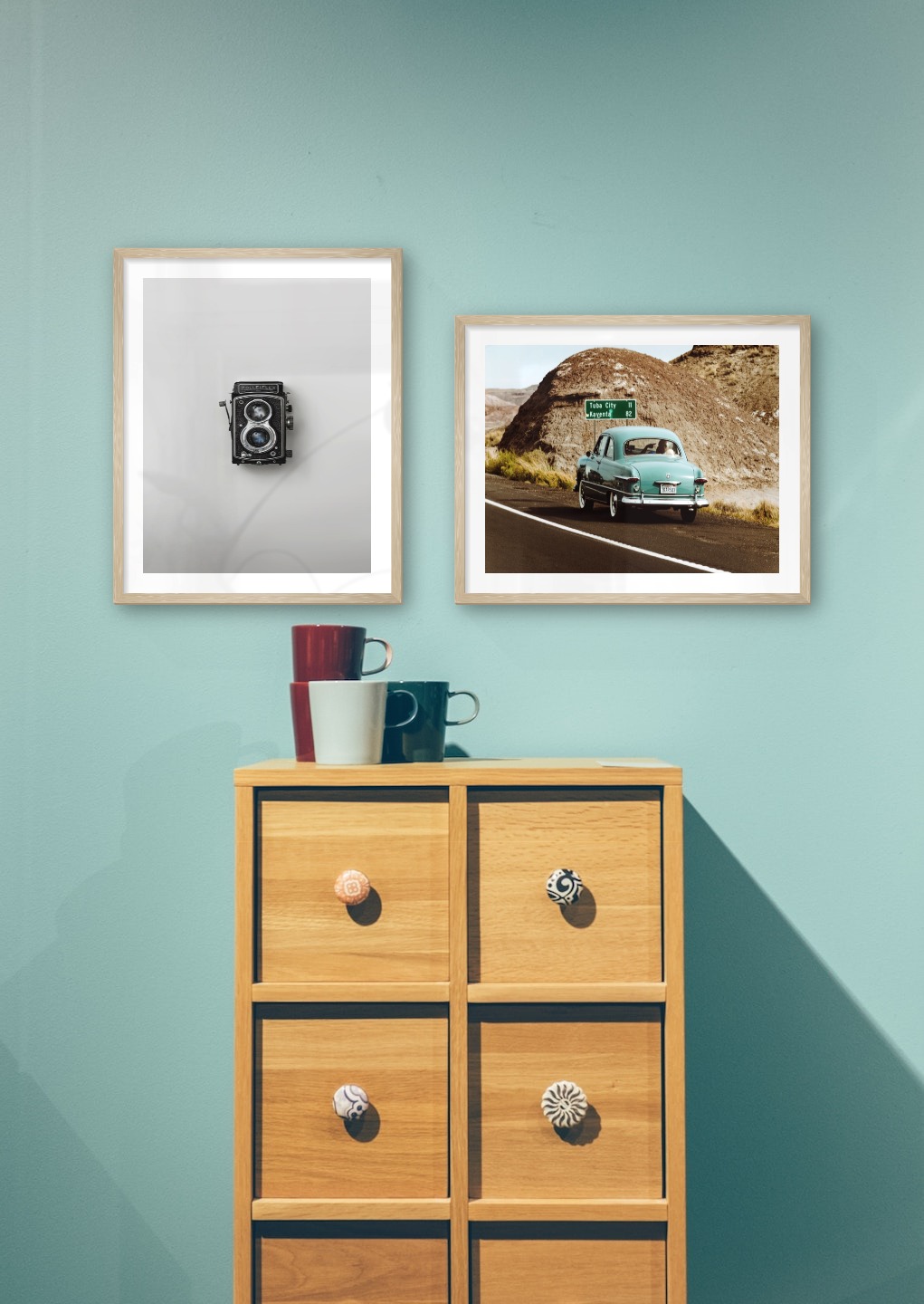 Gallery wall with picture frames in wood in sizes 40x50 with prints "Camera" and "Car on the road"