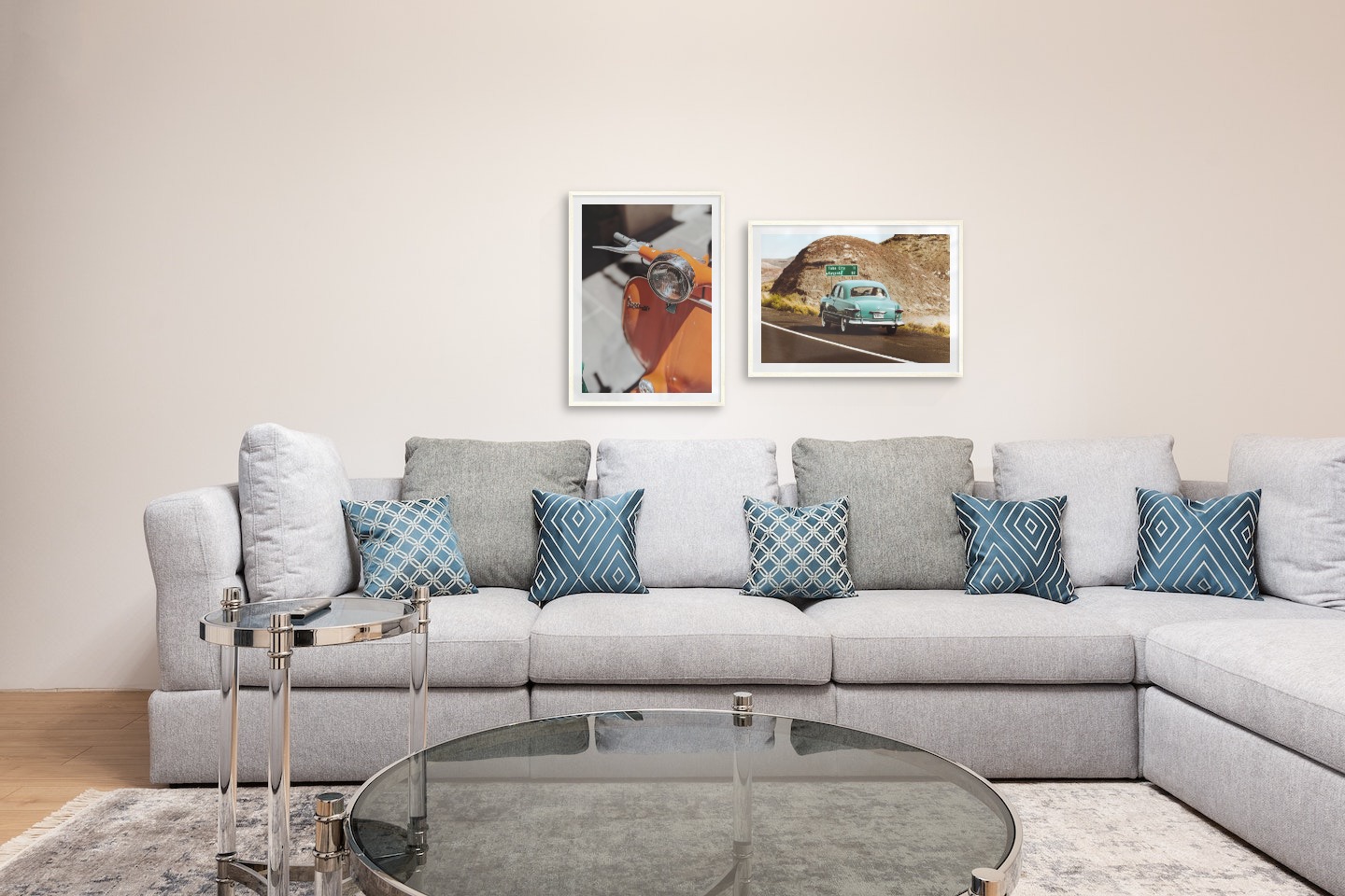 Gallery wall with picture frames in light wood in sizes 50x70 with prints "Orange vespa" and "Car on the road"