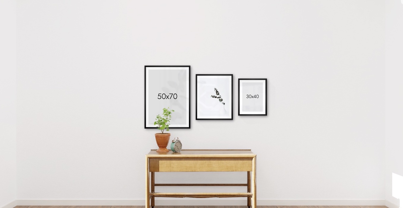 Image of three picture frames in a gallery wall