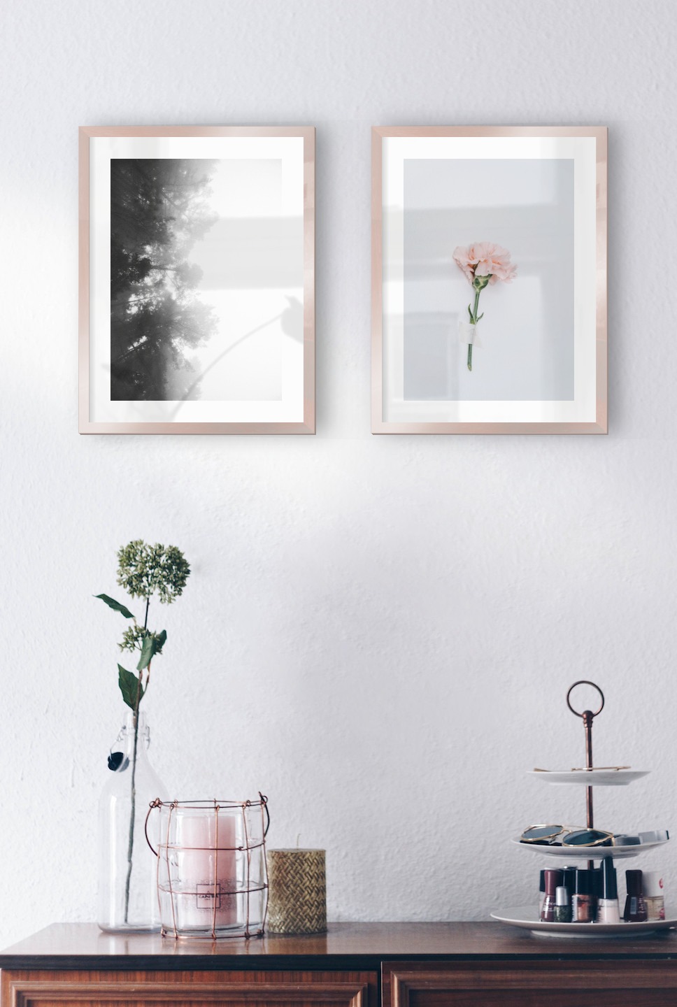 Gallery wall with picture frames in copper in sizes 30x40 with prints "Foggy wooden tops from the side" and "Pink flower"