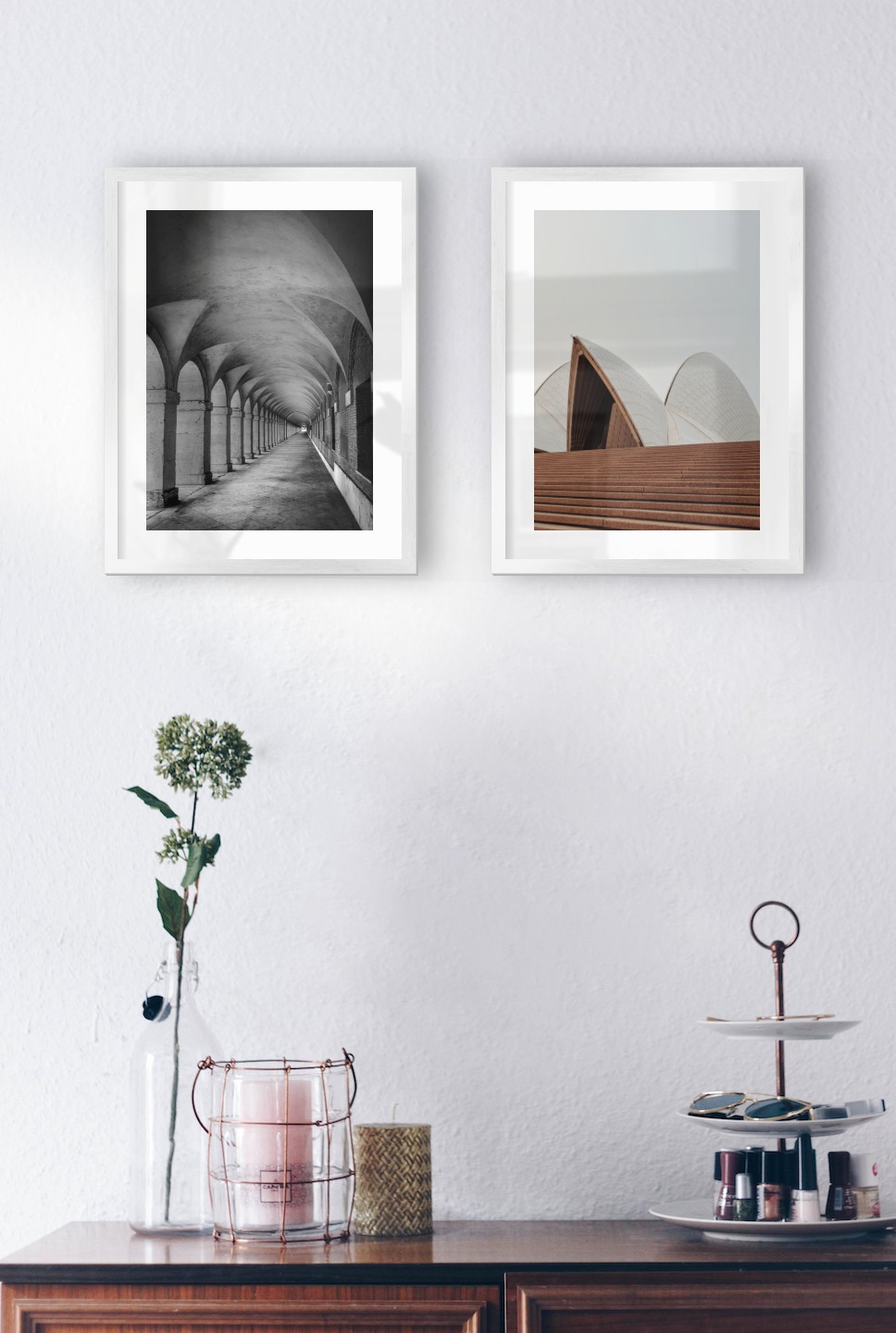 Gallery wall with picture frames in silver in sizes 30x40 with prints "Hallway with pillars and arches" and "Sydney Opera House"