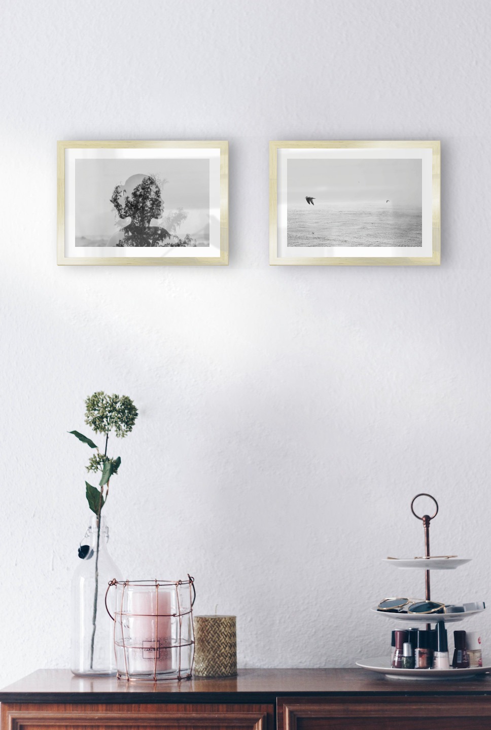 Gallery wall with picture frames in gold in sizes 21x30 with prints "Trees and silhouette" and "Birds over the sea"
