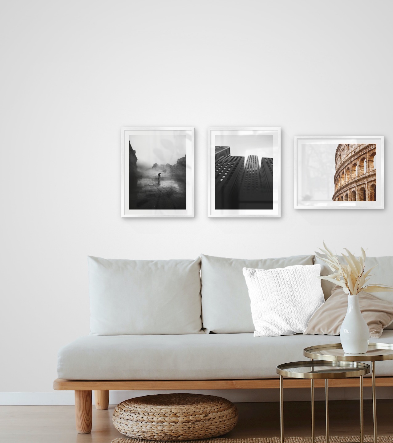 Gallery wall with picture frames in silver in sizes 40x50 with prints "Rainy city", "High buildings" and "Colosseum and Rome"