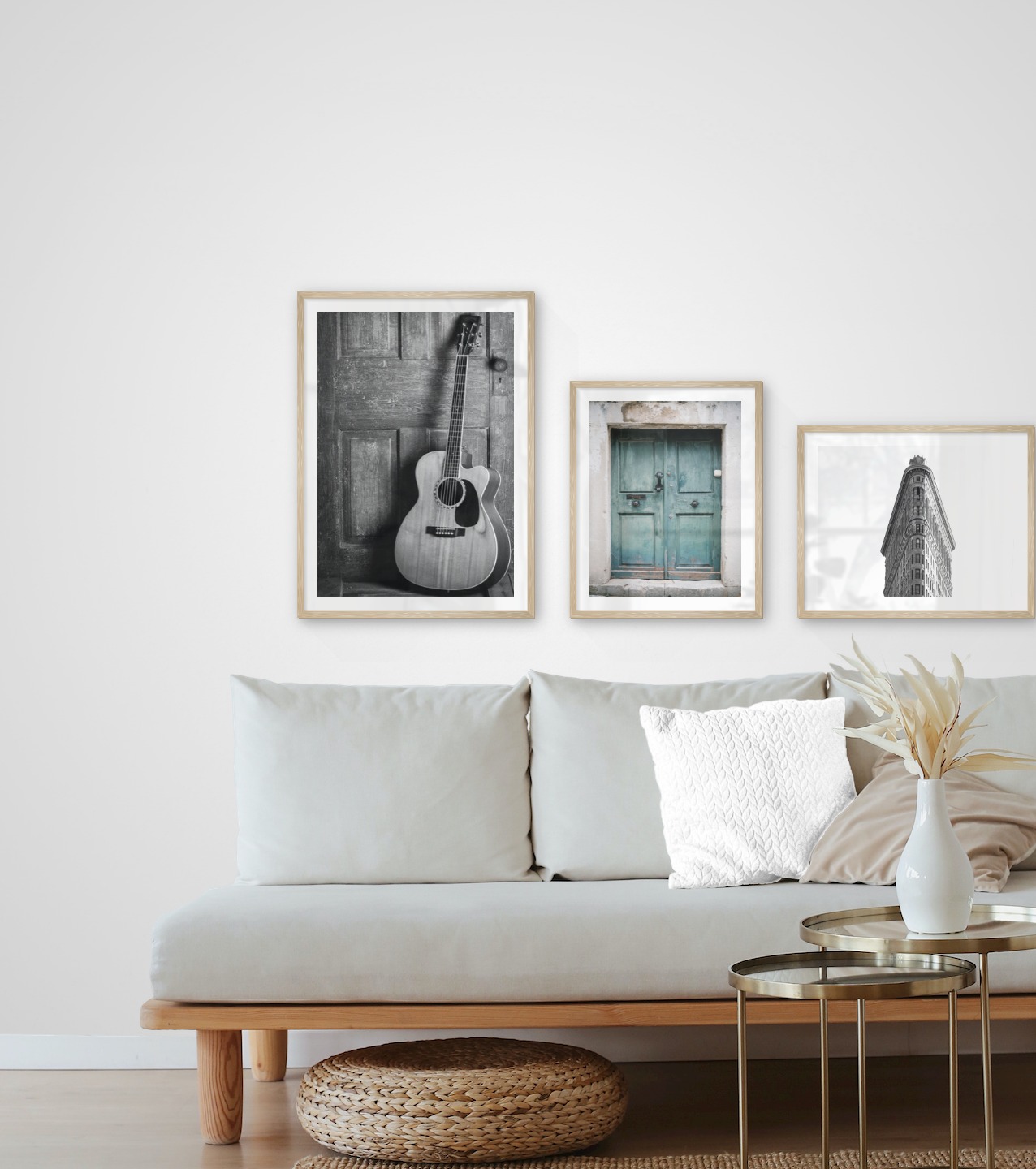 Gallery wall with picture frames in wood in sizes 50x70 and 40x50 with prints "Guitar", "Door" and "Triangular building"