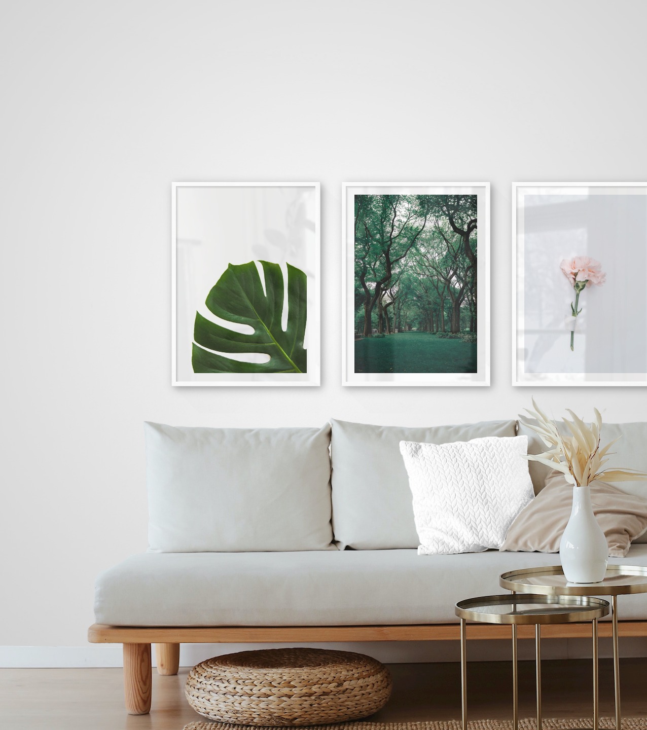 Gallery wall with picture frames in white in sizes 50x70 with prints "Plant", "Greenery and trees" and "Pink flower"