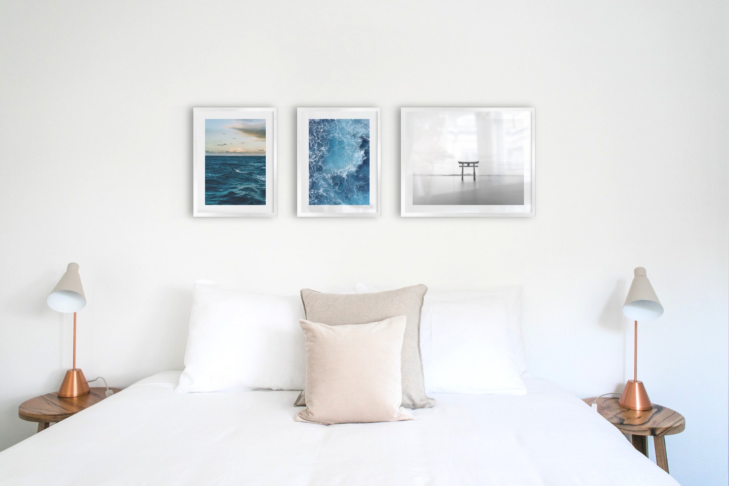 Gallery wall with picture frames in silver in sizes 30x40 and 40x50 with prints "Somewhat out at sea", "Sea from above" and "Pillars in the water"