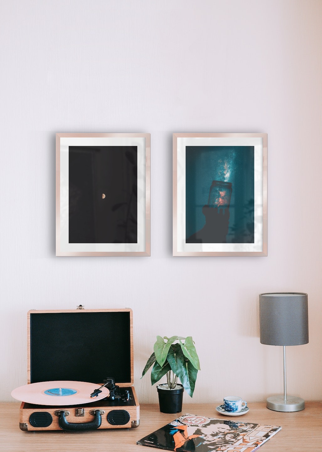 Gallery wall with picture frames in copper in sizes 30x40 with prints "The moon" and "Jar in front of space"