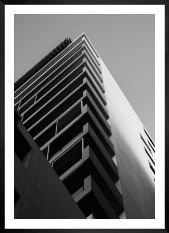 Gallery wall with picture frame in black in size 50x70 with print "Black and white building"