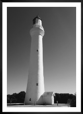 Gallery wall with picture frame in black in size 50x70 with print "White lighthouse"