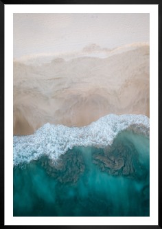 Gallery wall with picture frame in black in size 70x100 with print "Beach from above"