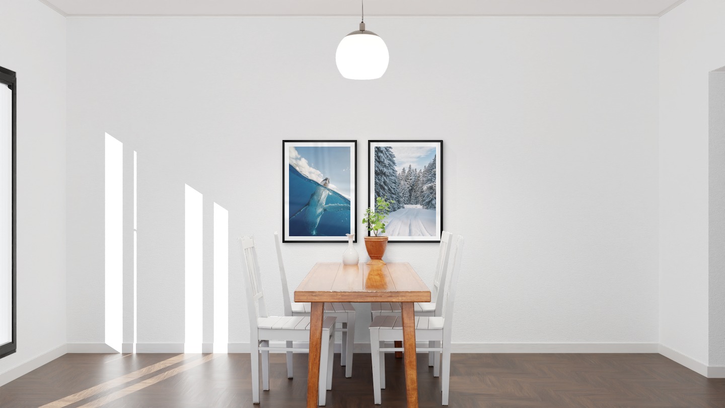 Gallery wall with picture frames in black in sizes 50x70 with prints "Choice in the water" and "Snowy road"