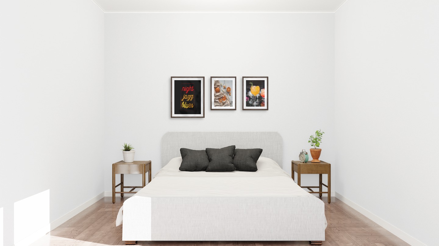 Gallery wall with picture frames in dark wood in sizes 40x50 and 30x40 with prints "Neon signs", "Oranges" and "High orange drink"