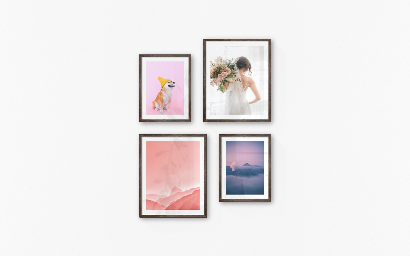 Gallery wall with picture frames in dark wood in sizes 30x40 and 40x50 with prints "Dog with yellow hat", "Bride and flowers", "Pink sky" and "Mountains above the clouds"
