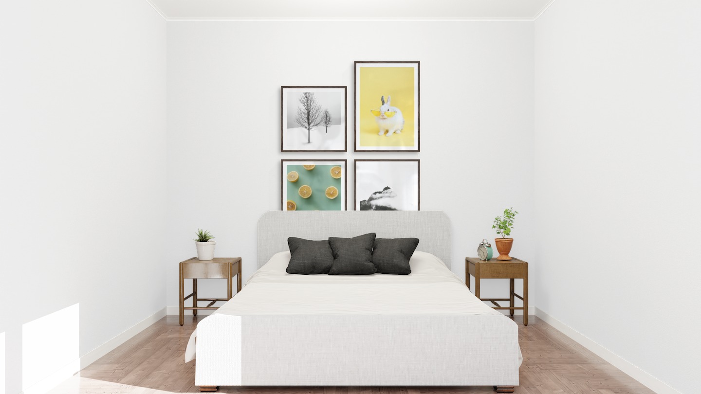 Gallery wall with picture frames in dark wood in sizes 50x50 and 50x70 with prints "Trees in the snow", "Rabbit with glasses", "Lemons" and "Mountain peaks in fog"