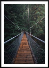 Gallery wall with picture frame in black in size 50x70 with print "Bridge in the woods"