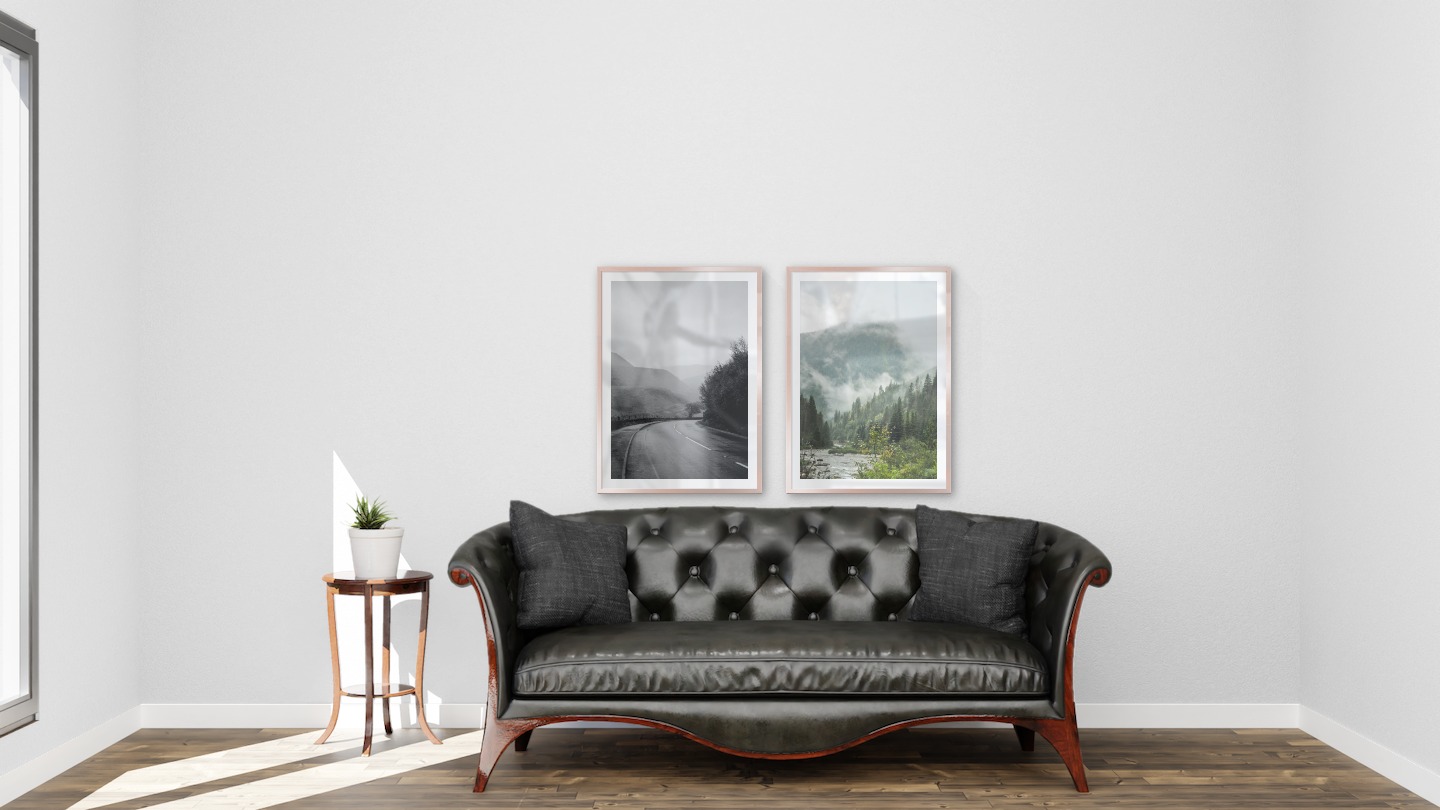 Gallery wall with picture frames in copper in sizes 50x70 with prints "Road that turns" and "River in front of mountains"
