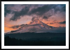 Gallery wall with picture frame in black in size 50x70 with print "Sunset and mountains"