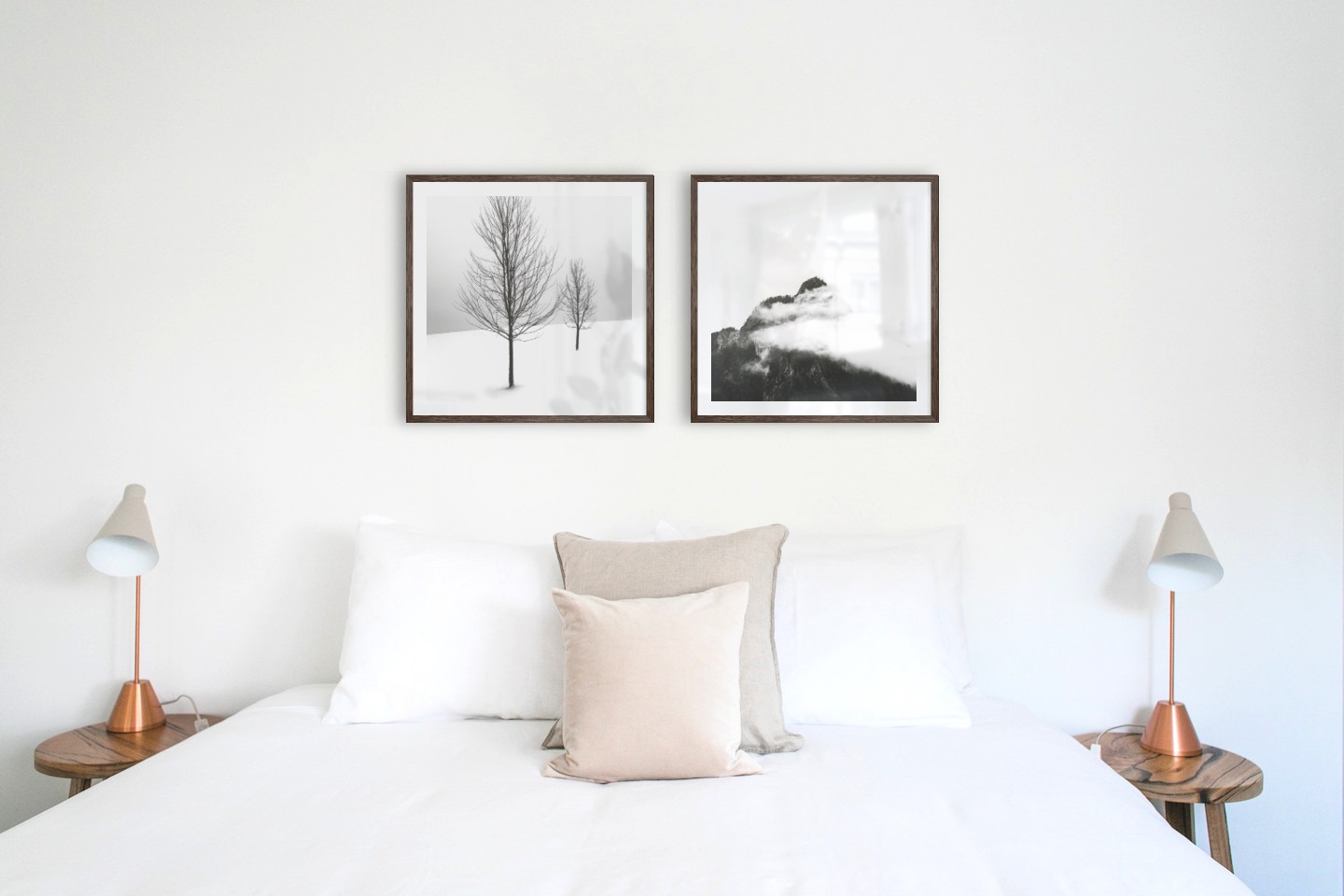 Gallery wall with picture frames in dark wood in sizes 50x50 with prints "Trees in the snow" and "Mountain peaks in fog"