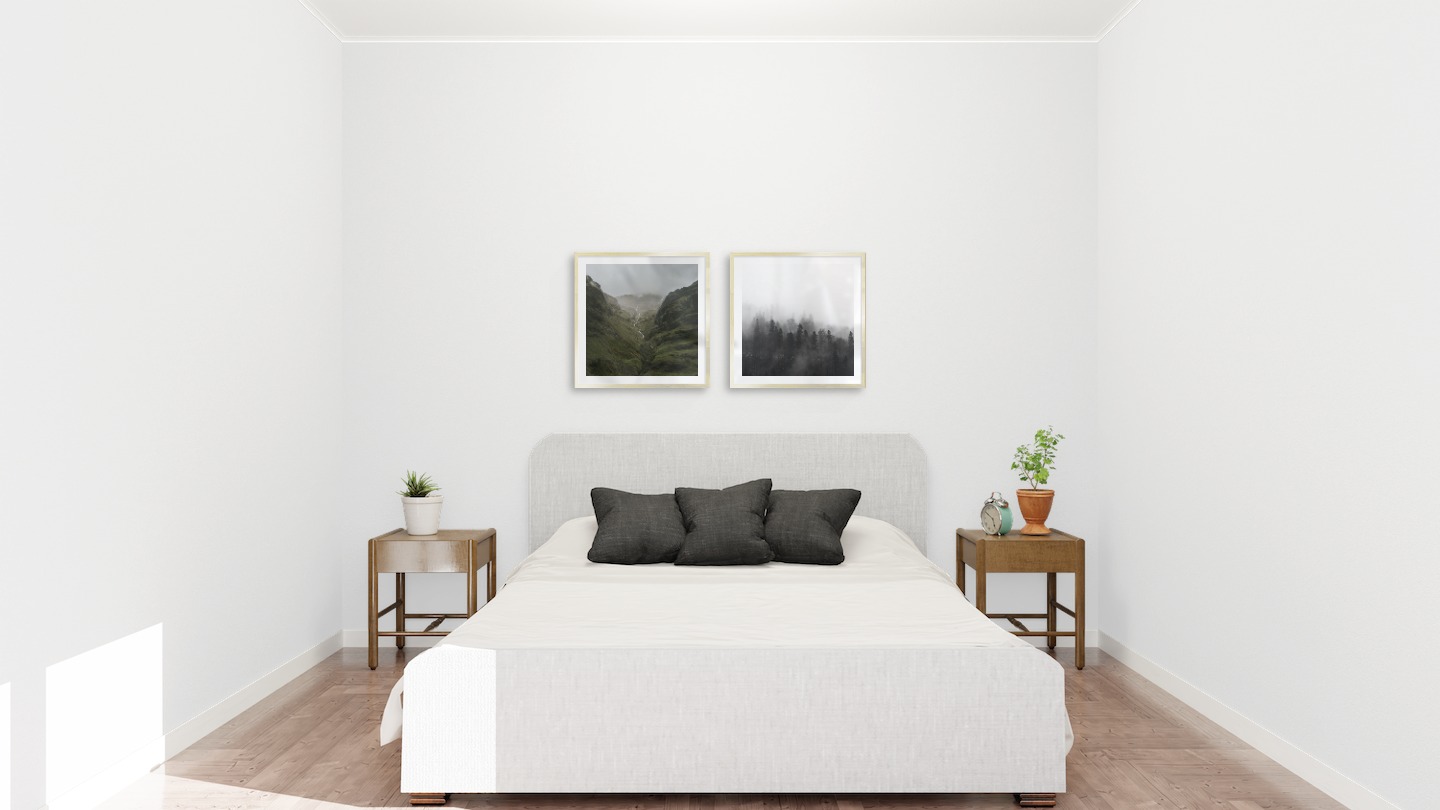 Gallery wall with picture frames in gold in sizes 50x50 with prints "Stream in valley" and "Foggy wooden tops"