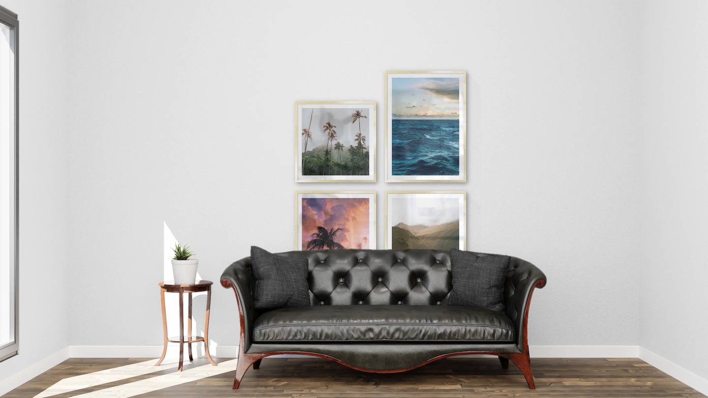Gallery wall with picture frames in gold in sizes 50x50 and 50x70 with prints "Palm trees and mountains", "Somewhat out at sea", "Palm on the beach" and "Foggy valley"