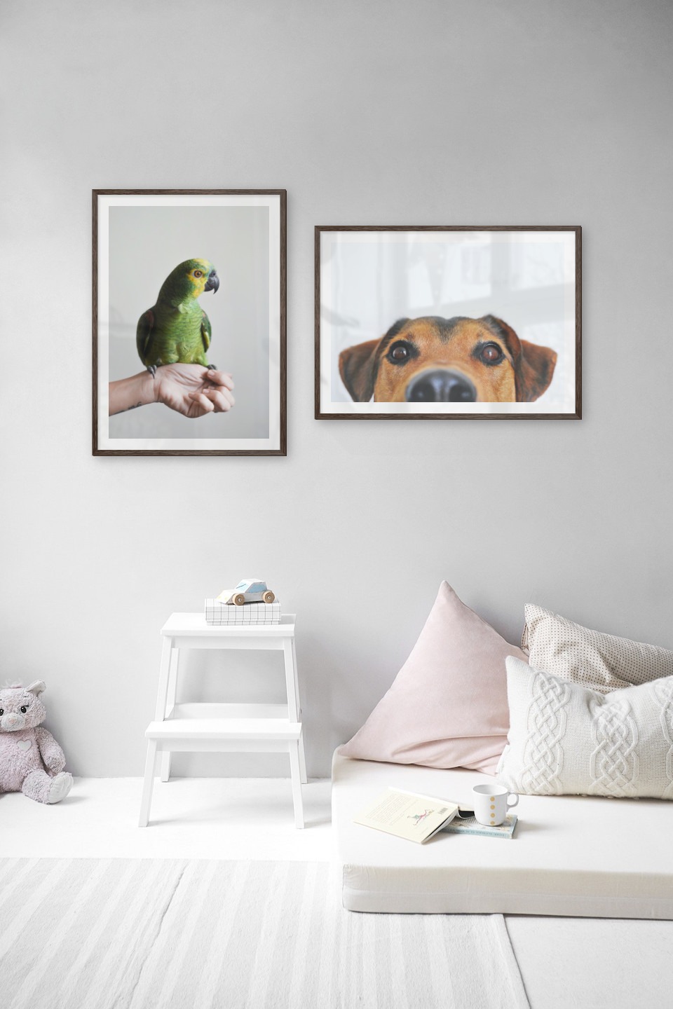 Gallery wall with picture frames in dark wood in sizes 50x70 with prints "Green parrot" and "Hundnos"