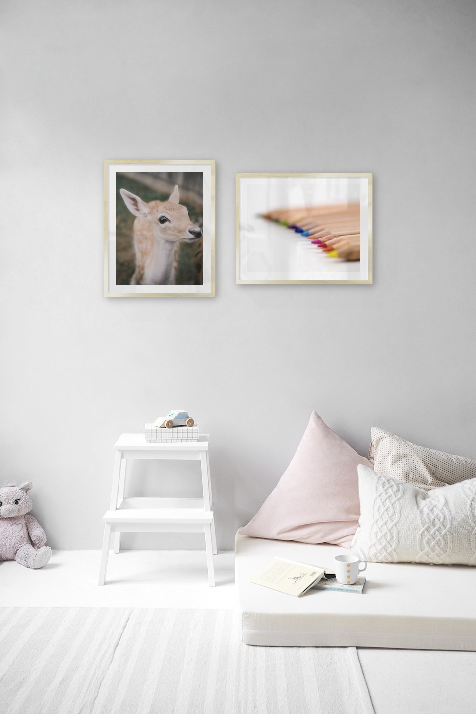 Gallery wall with picture frames in gold in sizes 40x50 with prints "Deer" and "Pencils in different colors"