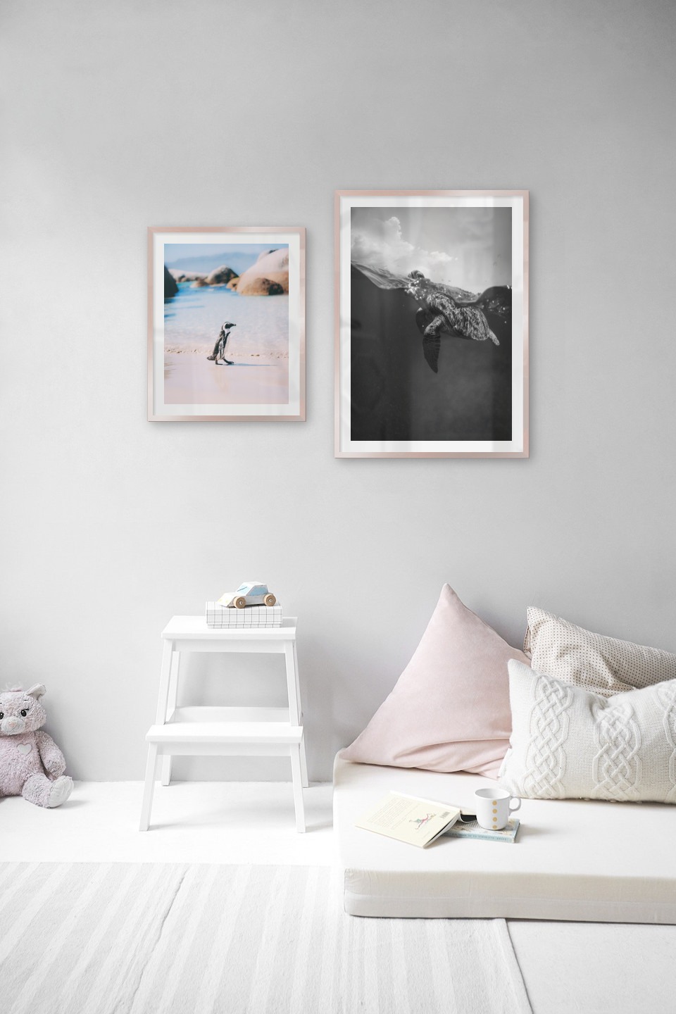 Gallery wall with picture frames in copper in sizes 40x50 and 50x70 with prints "Penguin on the beach" and "Turtle"