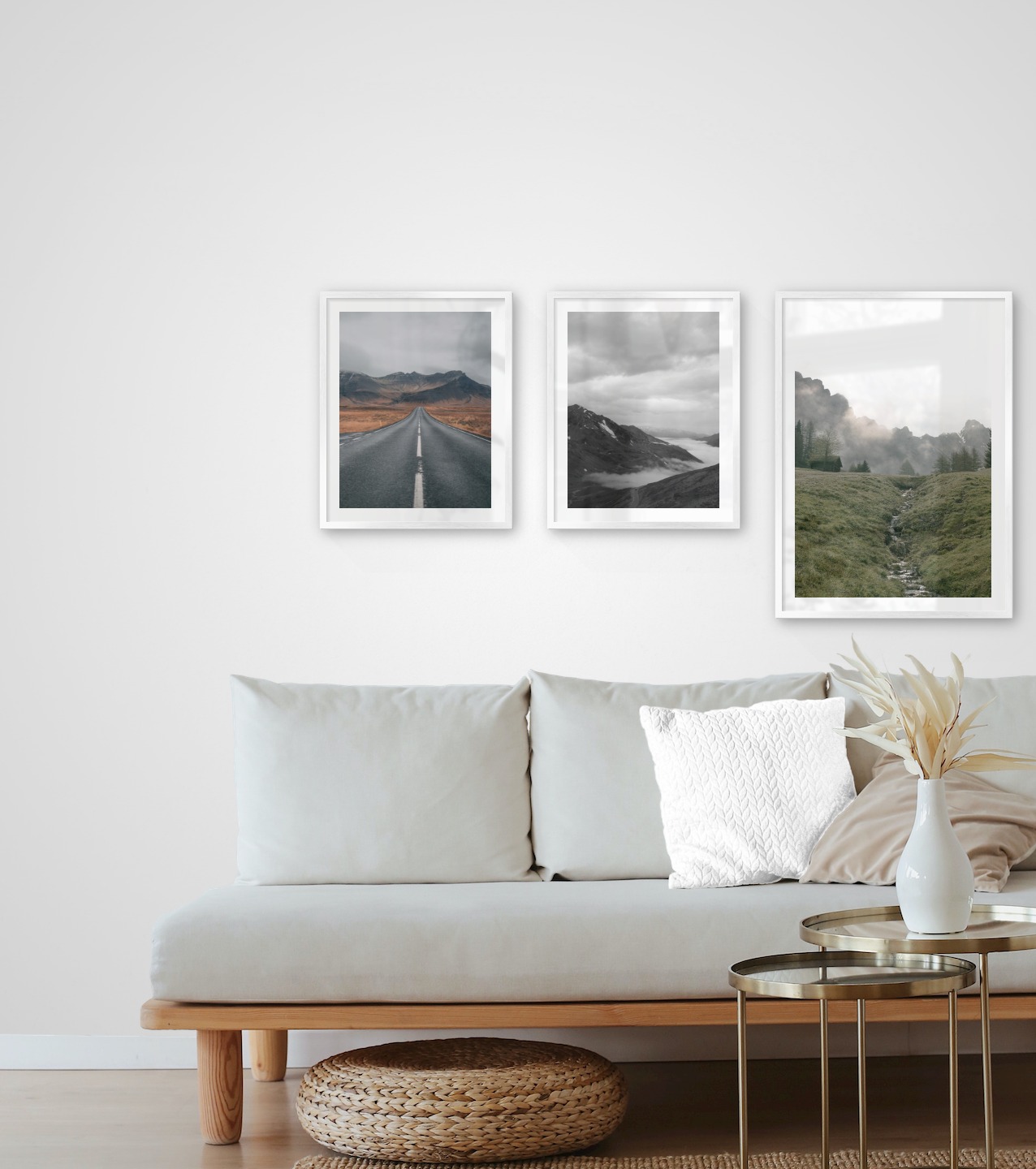 Gallery wall with picture frames in silver in sizes 40x50 and 50x70 with prints "Road and mountains", "Road among mountains" and "Green valley in front of mountains"