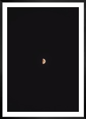 Gallery wall with picture frame in black in size 50x70 with print "The moon"