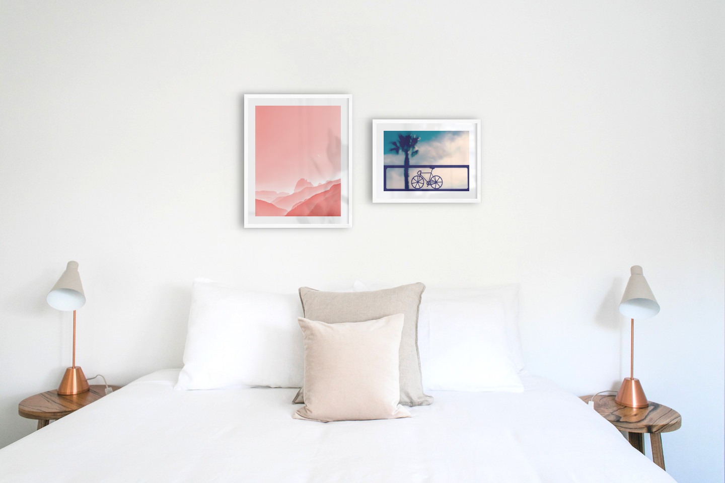 Gallery wall with picture frames in white in sizes 40x50 and 30x40 with prints "Pink sky" and "Bicycle in front of sky"